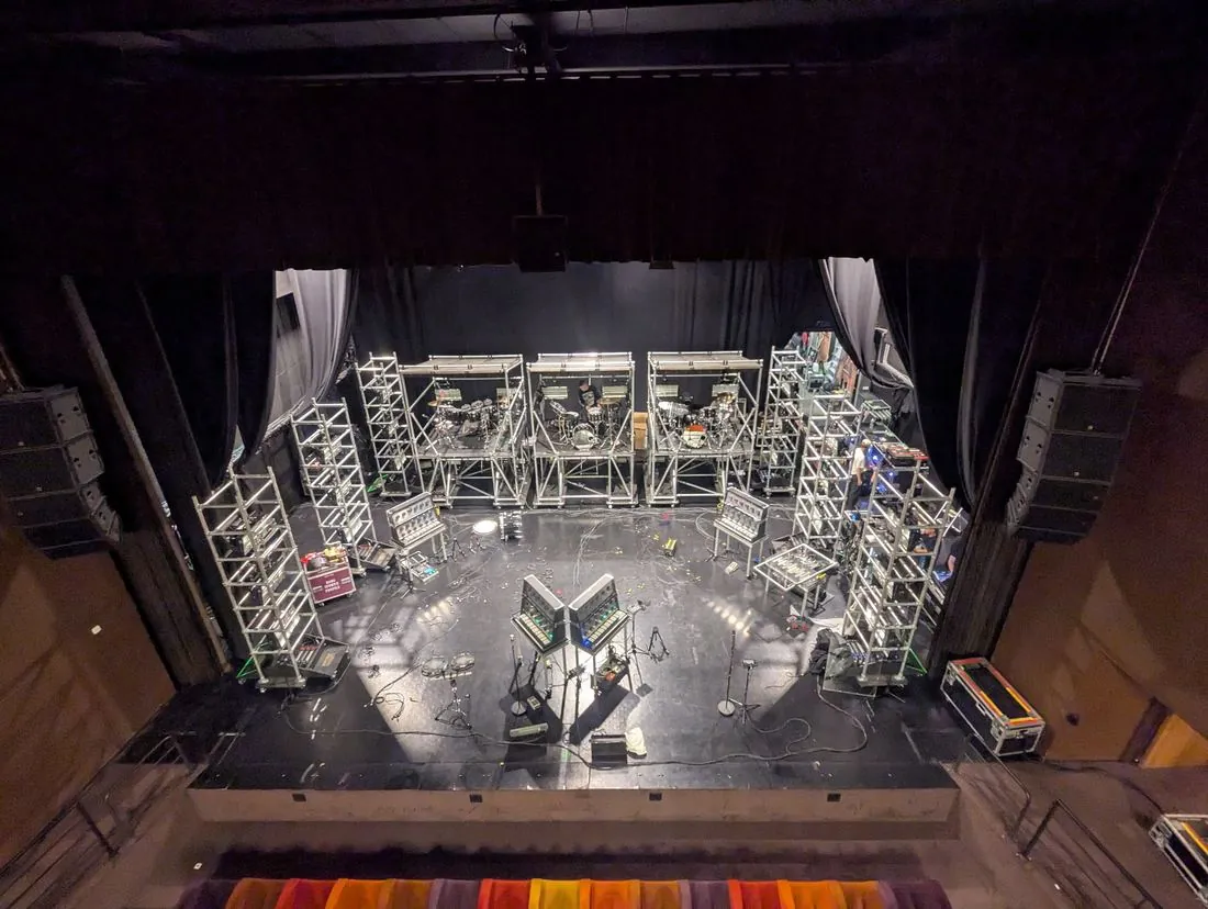 Overhead view of the Soulwax set during the build: scaffold drum risers, rack towers and synth stations
