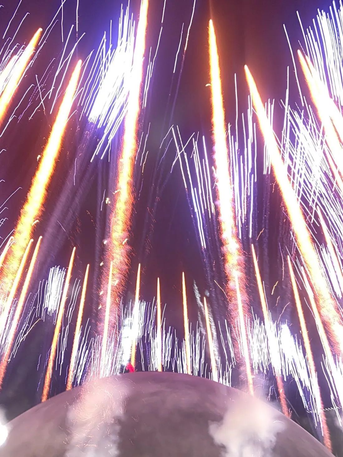 Pyrotechnics raining over the dome stage on Ye's 2026 stadium tour